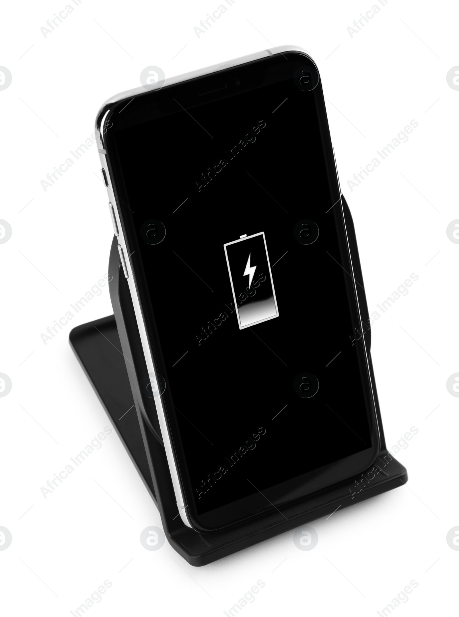 Photo of Mobile phone charging with wireless pad isolated on white