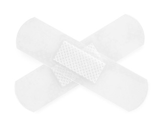 Photo of Medical adhesive bandages isolated on white, top view