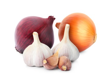 Onions, garlic bulbs and cloves on white background