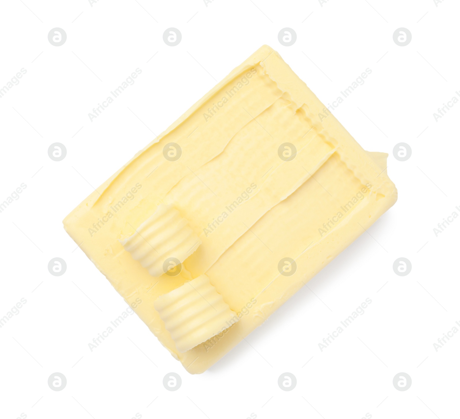 Photo of Tasty butter and curls isolated on white, top view