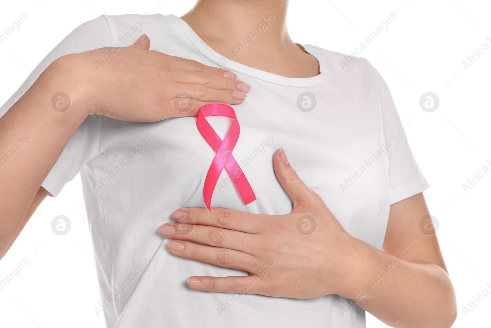 Photo of Woman with pink ribbon on white background, closeup. Breast cancer awareness