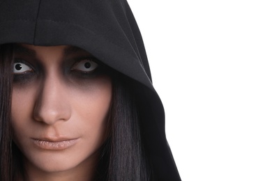 Photo of Mysterious witch with spooky eyes on white background, closeup