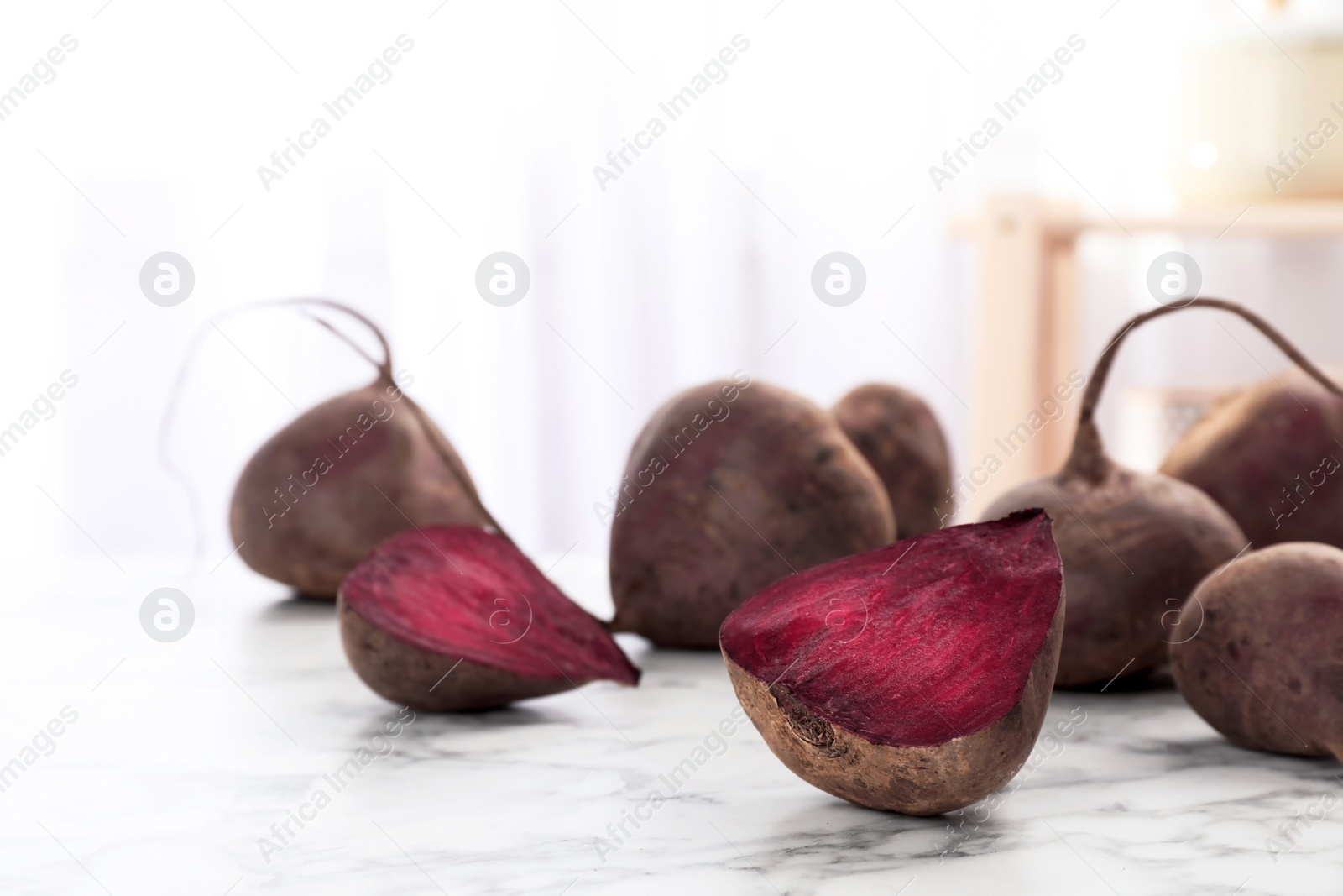 Photo of Cut ripe beet on table, close up