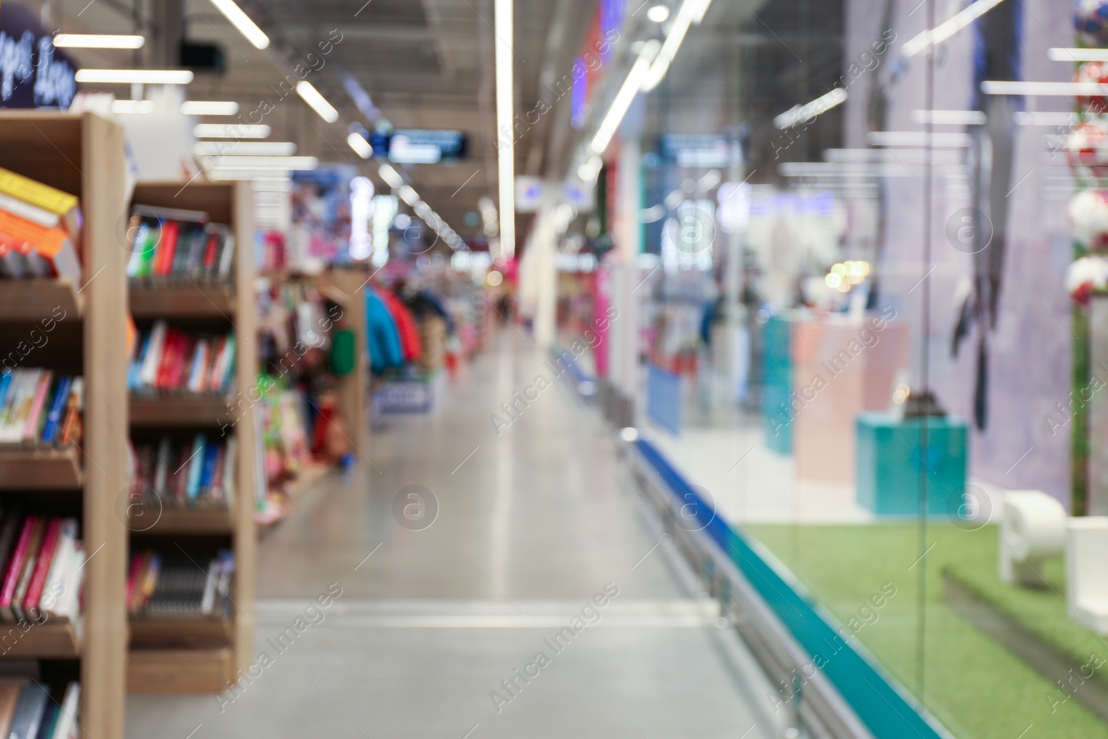 Photo of Blurred view of shopping mall interior. Bokeh effect