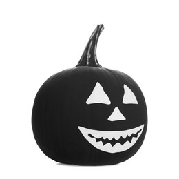Photo of Black pumpkin with drawn scary face isolated on white. Halloween celebration