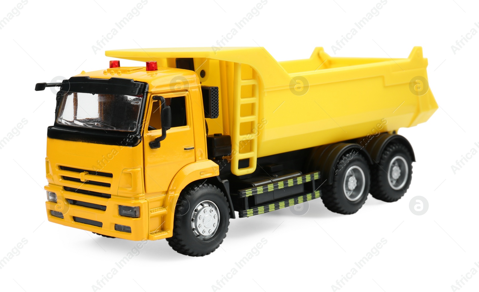 Photo of Yellow truck isolated on white. Children's toy