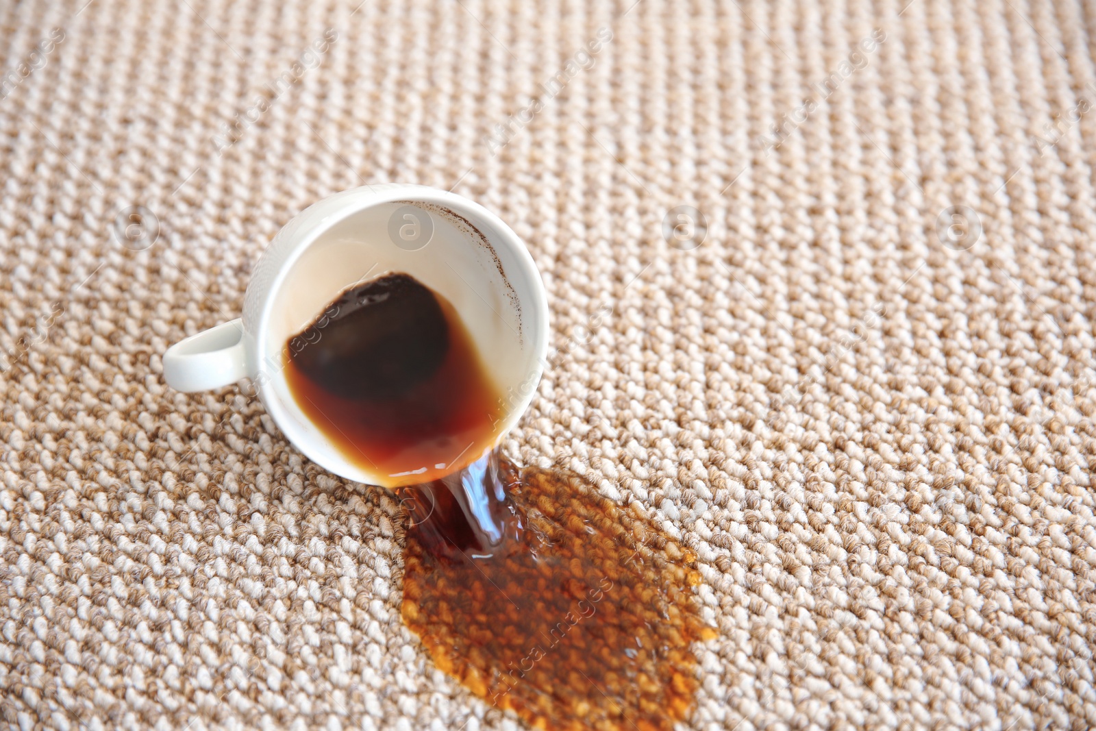 Photo of Spilled coffee on carpet