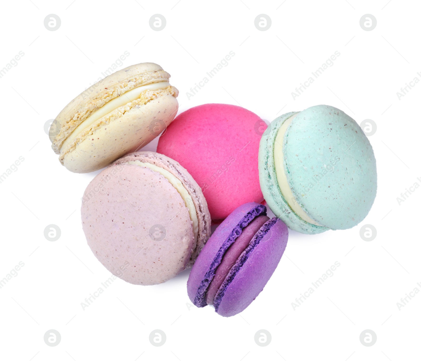 Photo of Different delicious colorful macarons on white background, top view