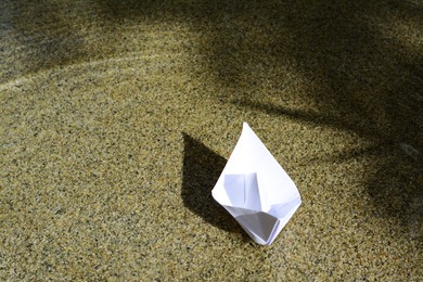 Photo of Beautiful white paper boat on water outdoors