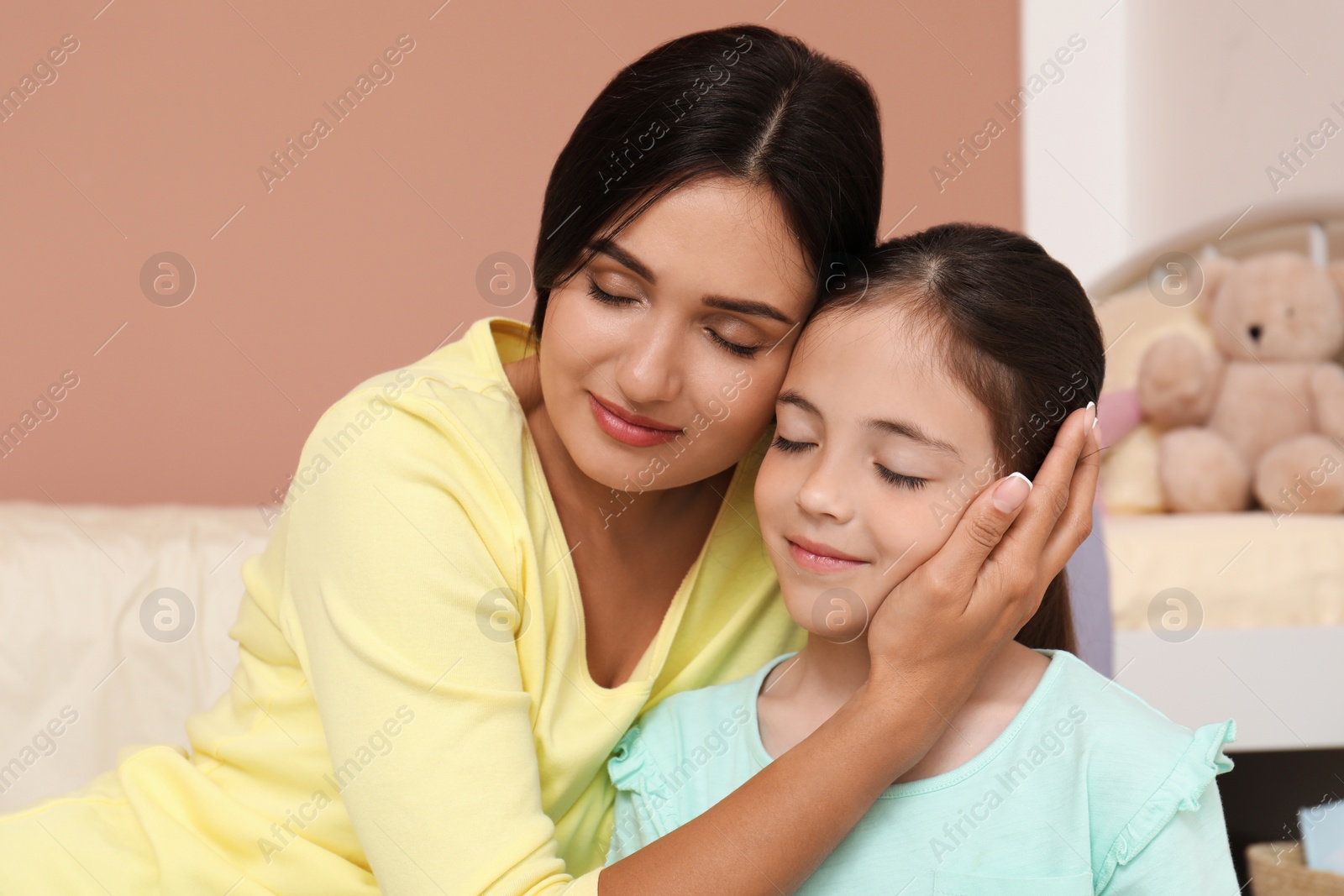 Photo of Happy mother and daughter at home. Single parenting