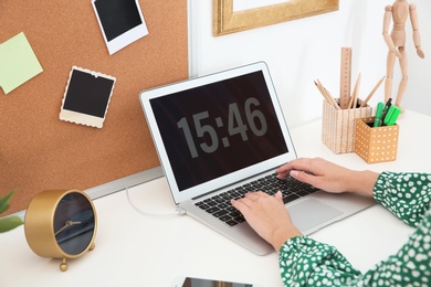 Photo of Woman using computer in home office. Stylish workplace