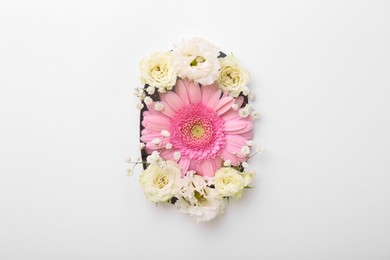 Photo of Number 0 made of beautiful flowers on white background, top view