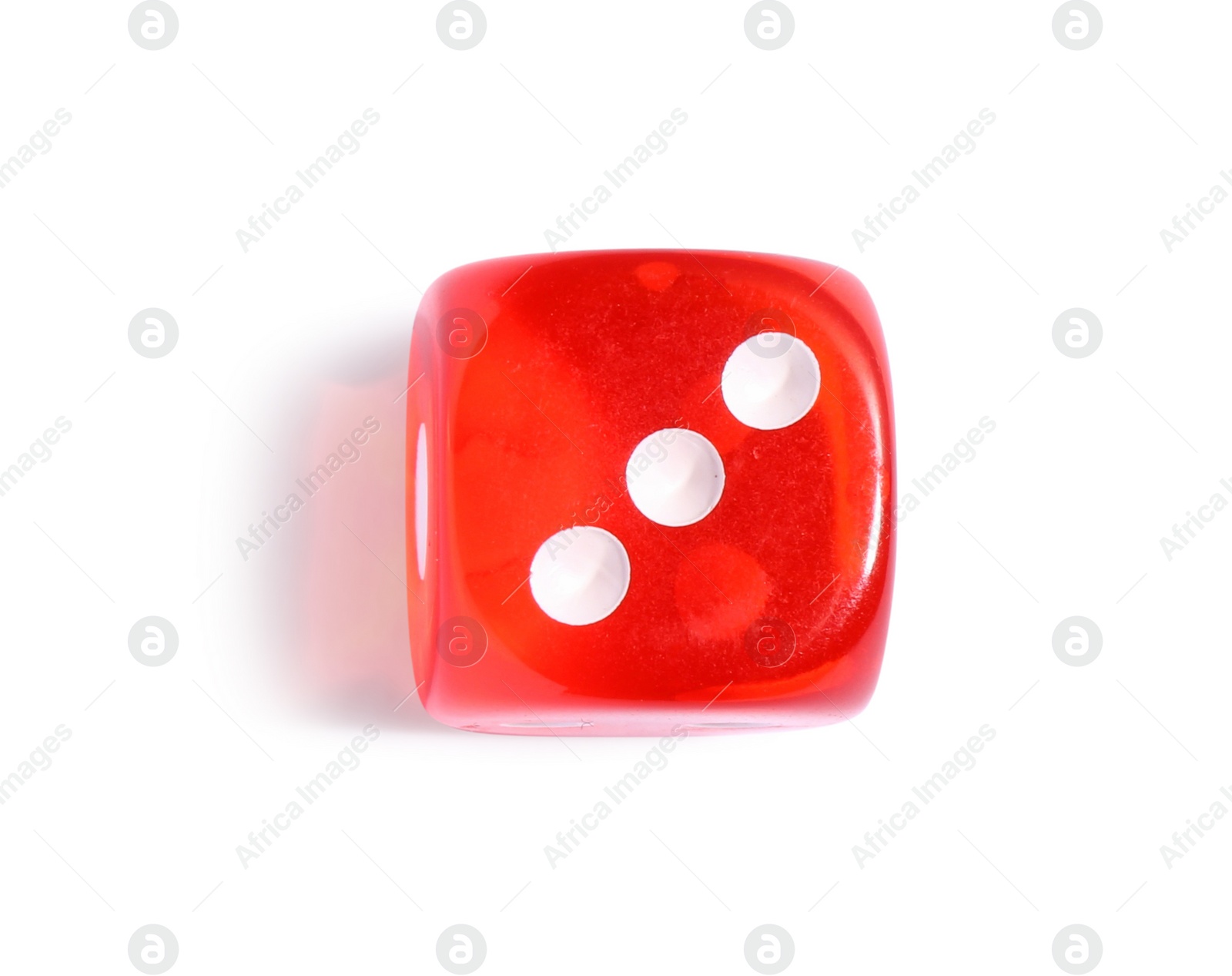 Photo of One red game dice isolated on white, top view