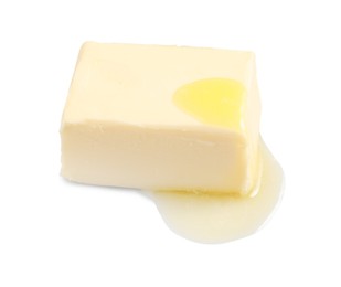 Photo of Piece of melting butter on white background