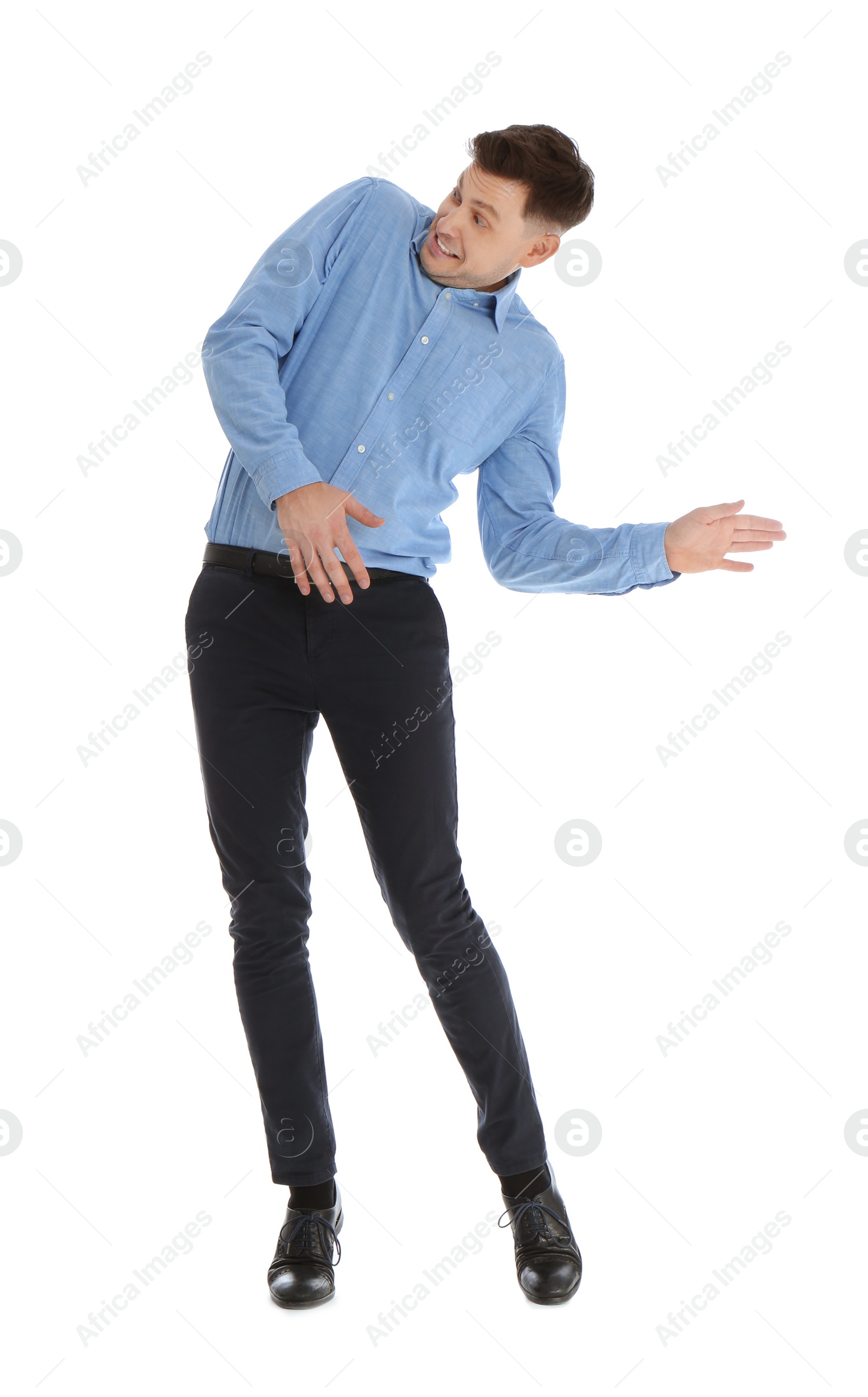 Photo of Emotional man in office wear posing on white background