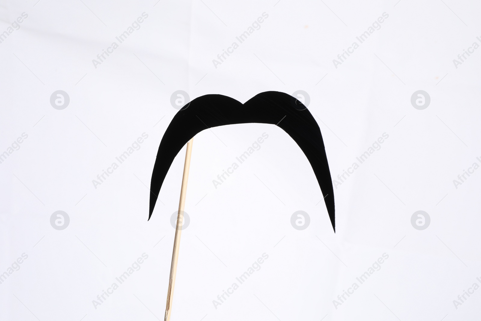 Photo of Fake paper mustache party prop against white background