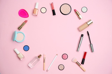 Flat lay composition with makeup products for woman on color background