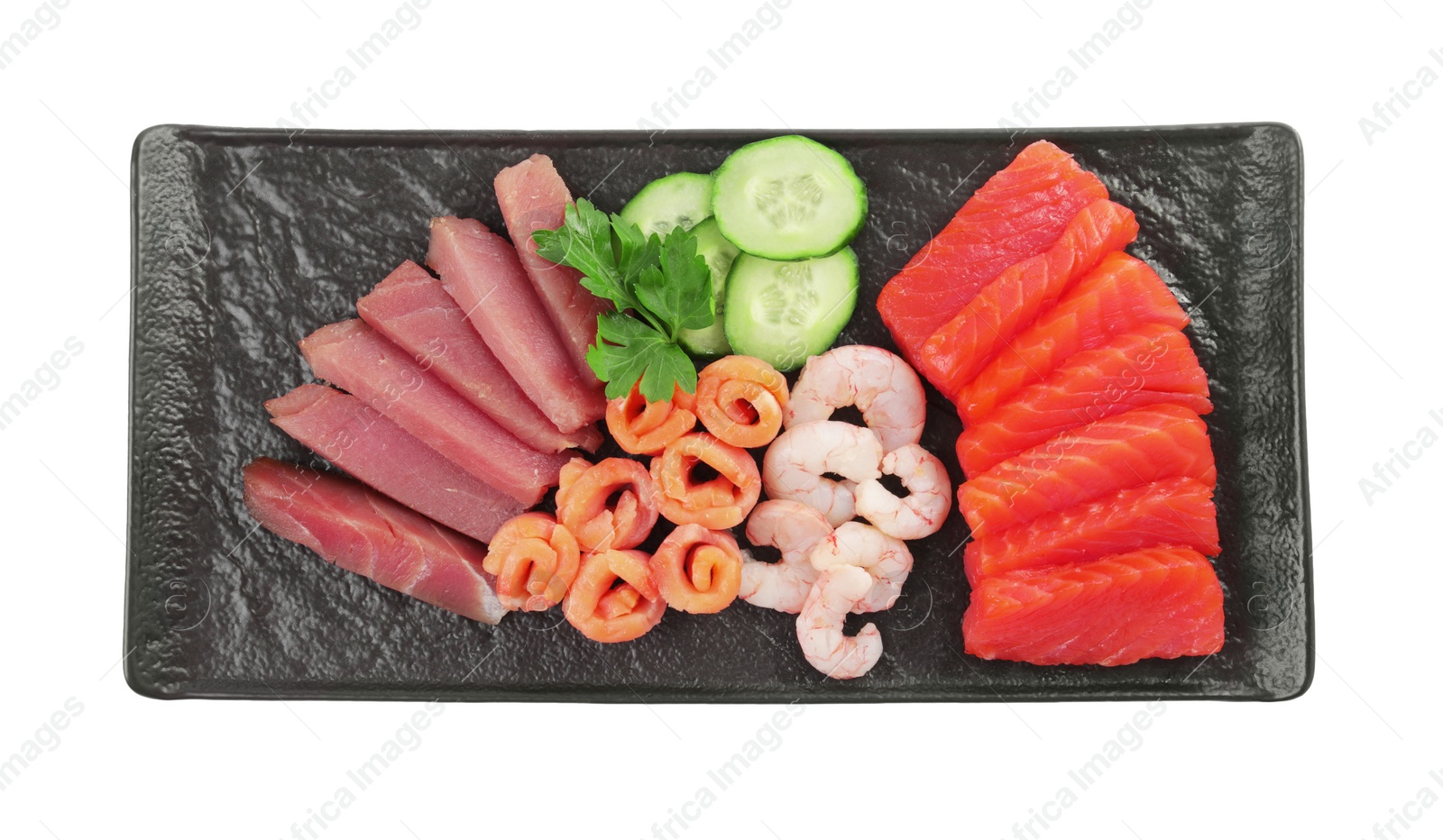 Photo of Delicious sashimi set of tuna, salmon and shrimps served with cucumbers and parsley isolated on white, top view