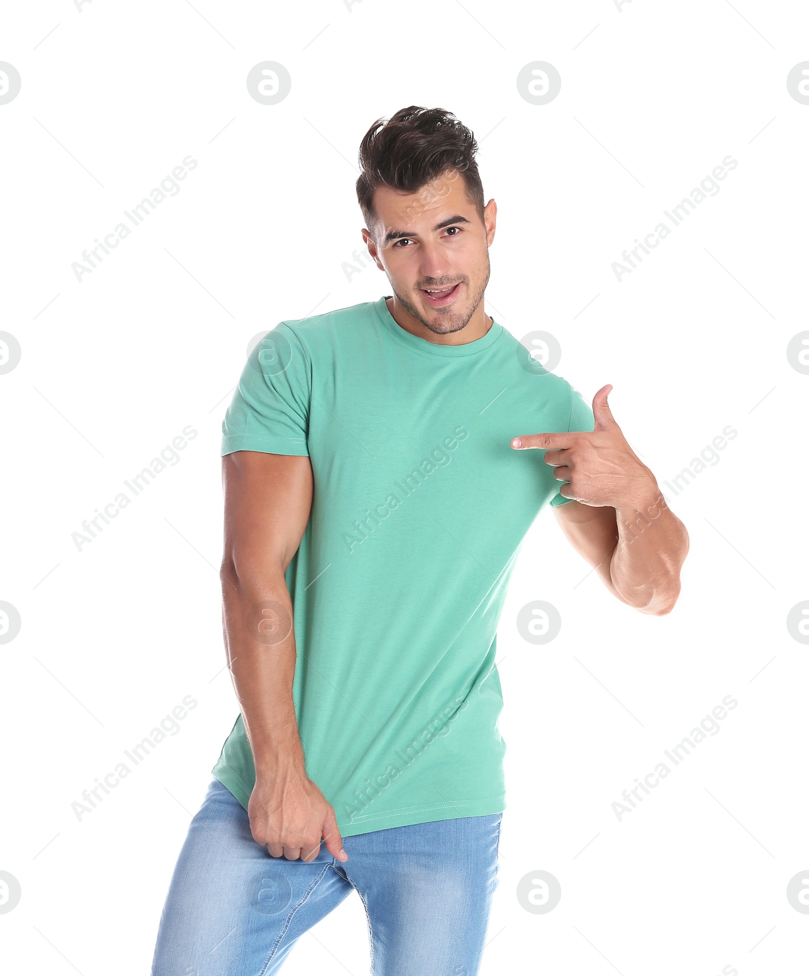 Photo of Young man in t-shirt on white background. Mockup for design