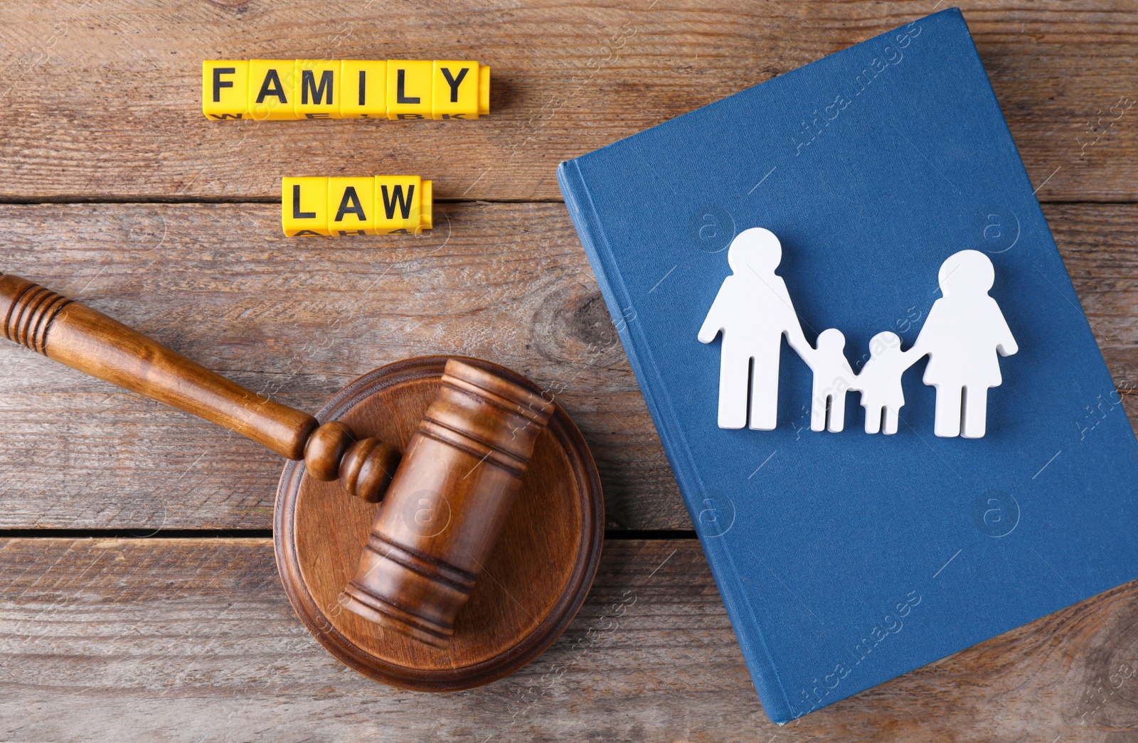 Image of Family law concept. Flat lay composition with book and judge gavel on wooden background