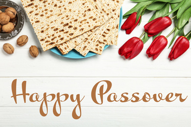Image of Flat lay composition with matzos on white wooden background. Passover (Pesach) celebration