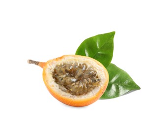Tasty ripe granadilla and green leaves on white background