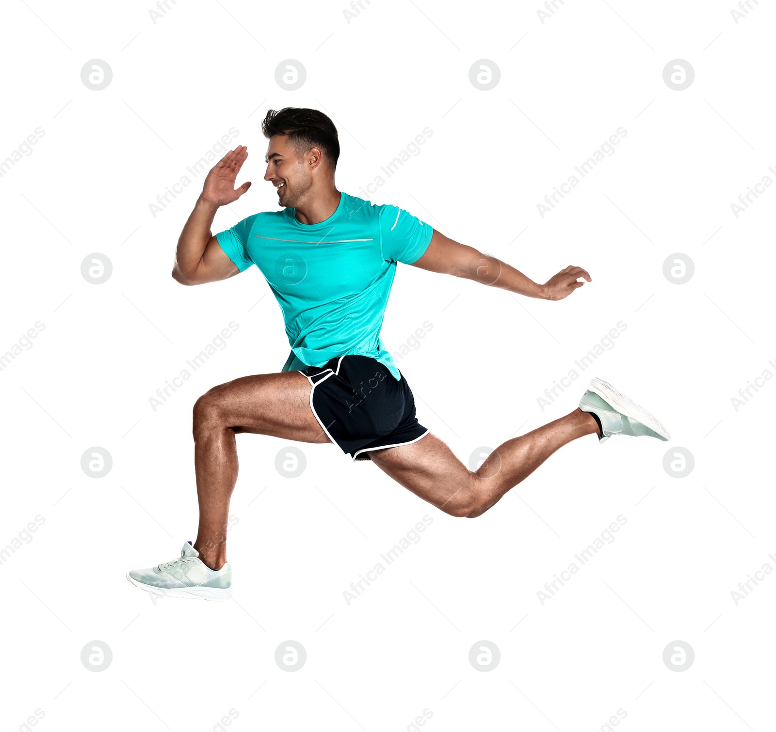 Photo of Handsome young man running on white background