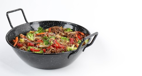 Stir-fry. Tasty noodles with meat and vegetables in wok on white background, space for text