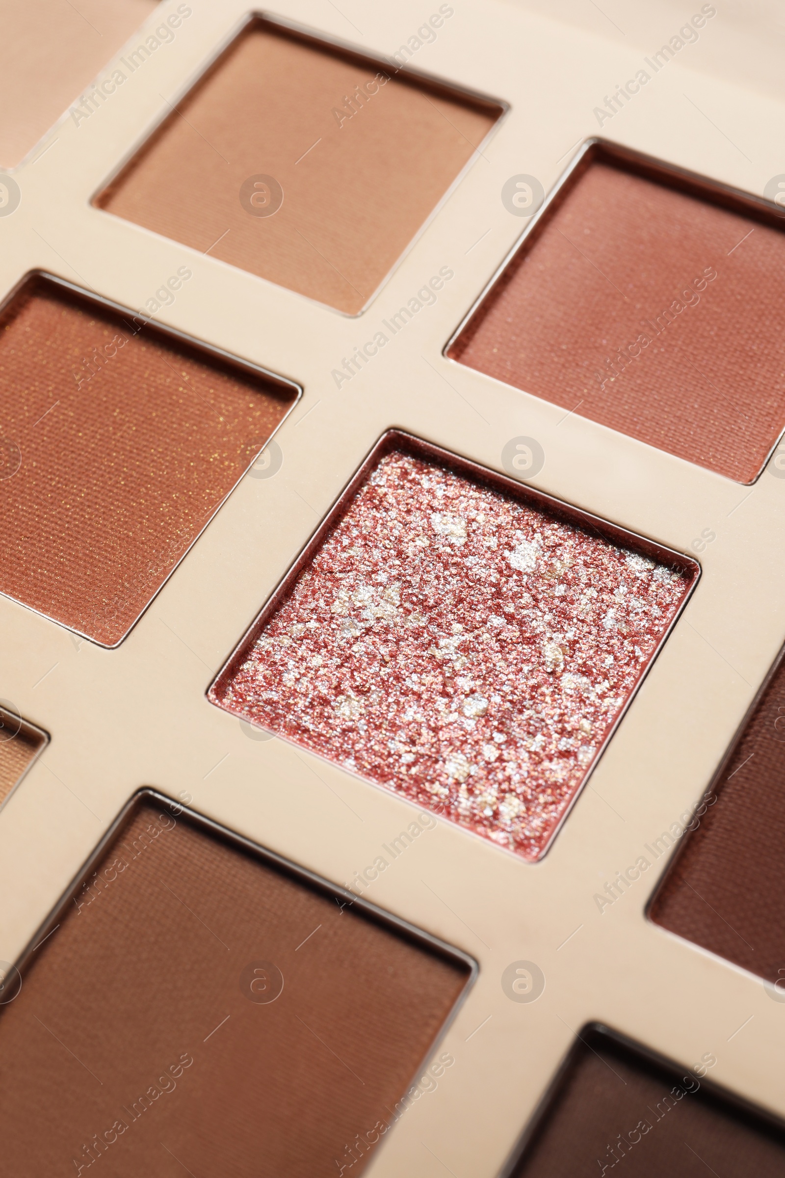 Photo of Beautiful eye shadow palette as background, closeup