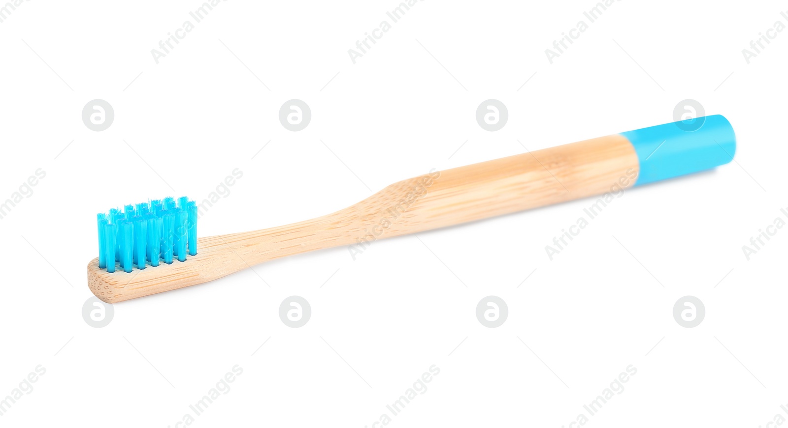 Photo of Bamboo toothbrush with blue bristle isolated on white