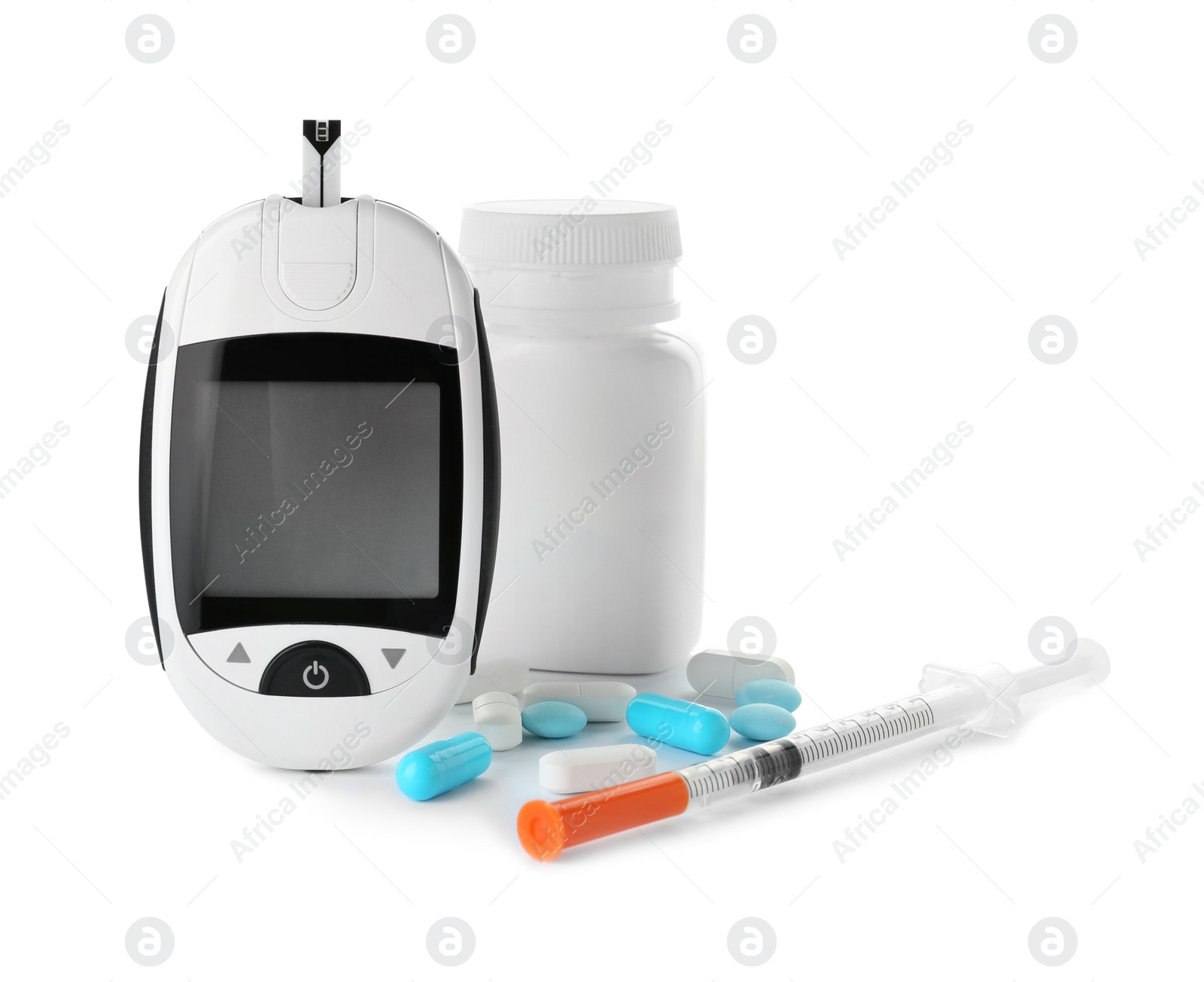 Photo of Digital glucometer, pills and syringe on white background. Diabetes concept