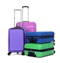 Stylish suitcases packed for travel on white background 