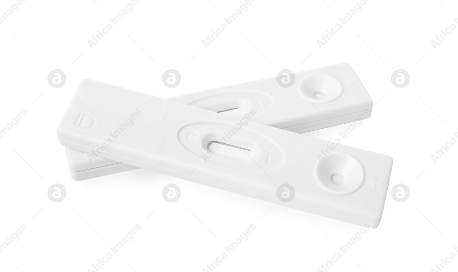 Photo of Two disposable express tests for hepatitis on white background