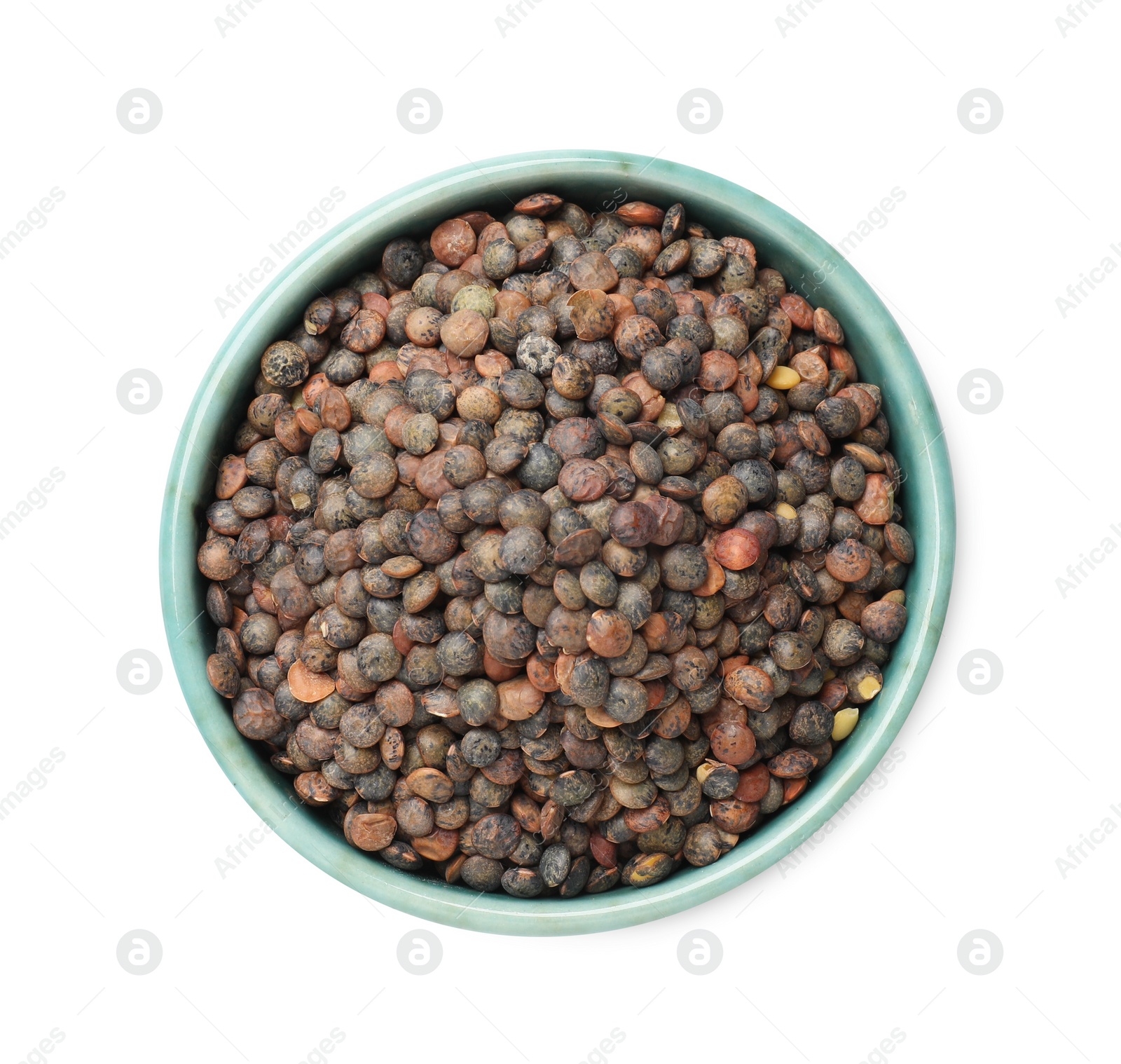 Photo of Raw lentils in bowl isolated on white, top view