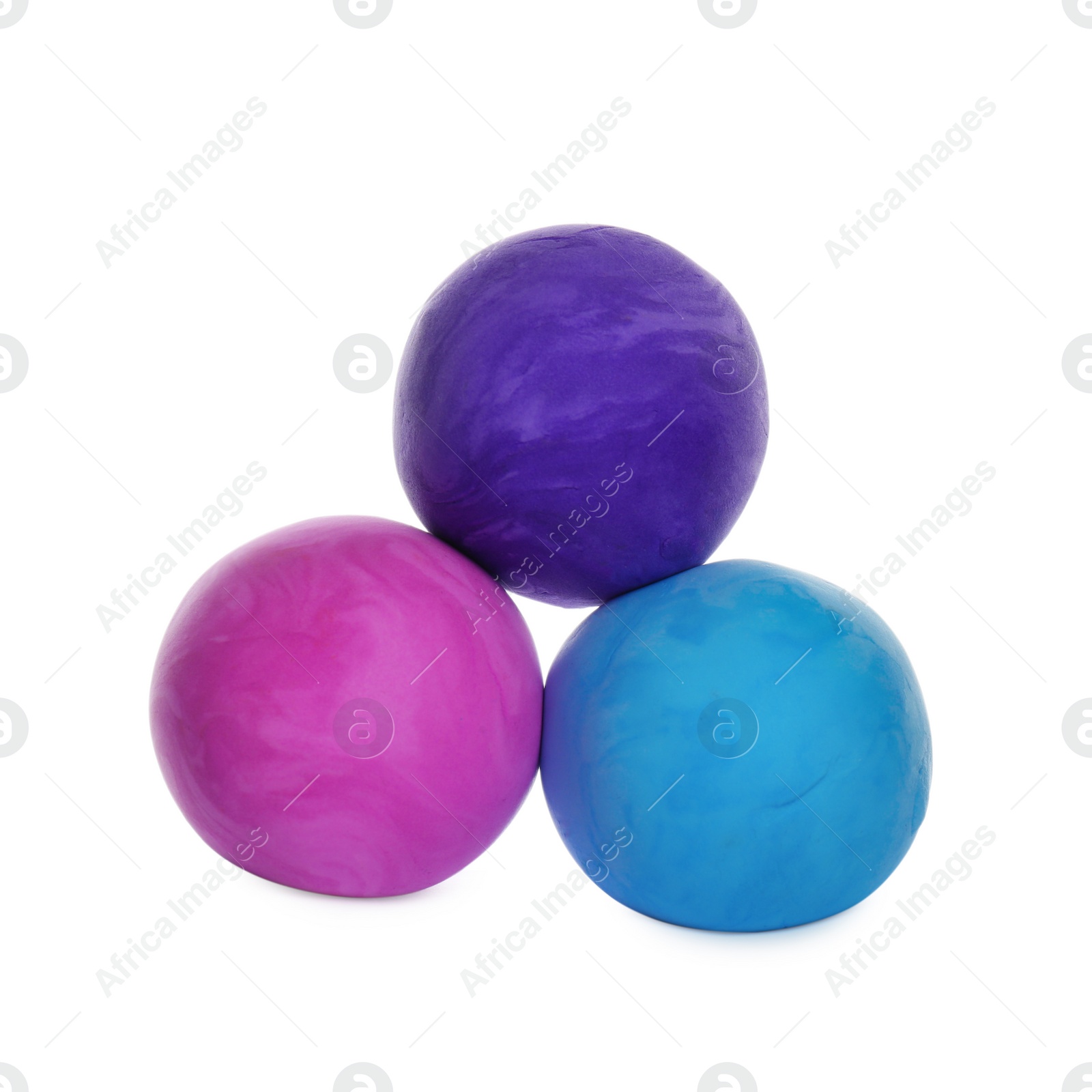 Photo of Different color play dough balls isolated on white