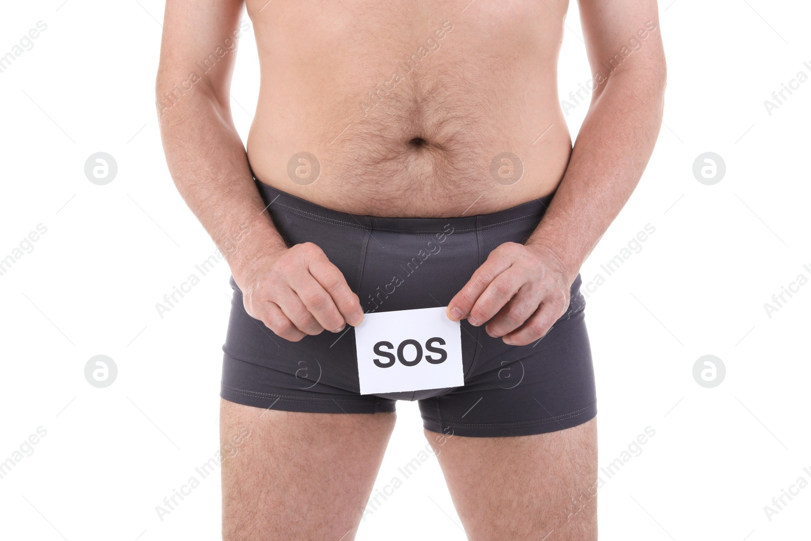 Photo of Mature man with urological problems holding SOS sign on white background