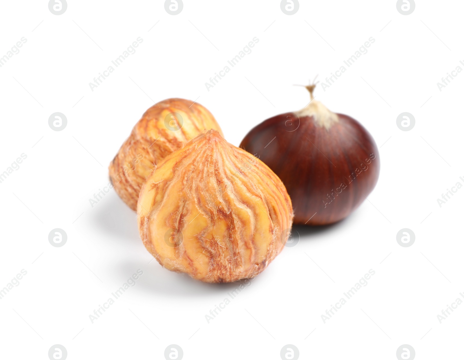 Photo of Fresh sweet edible chestnuts on white background