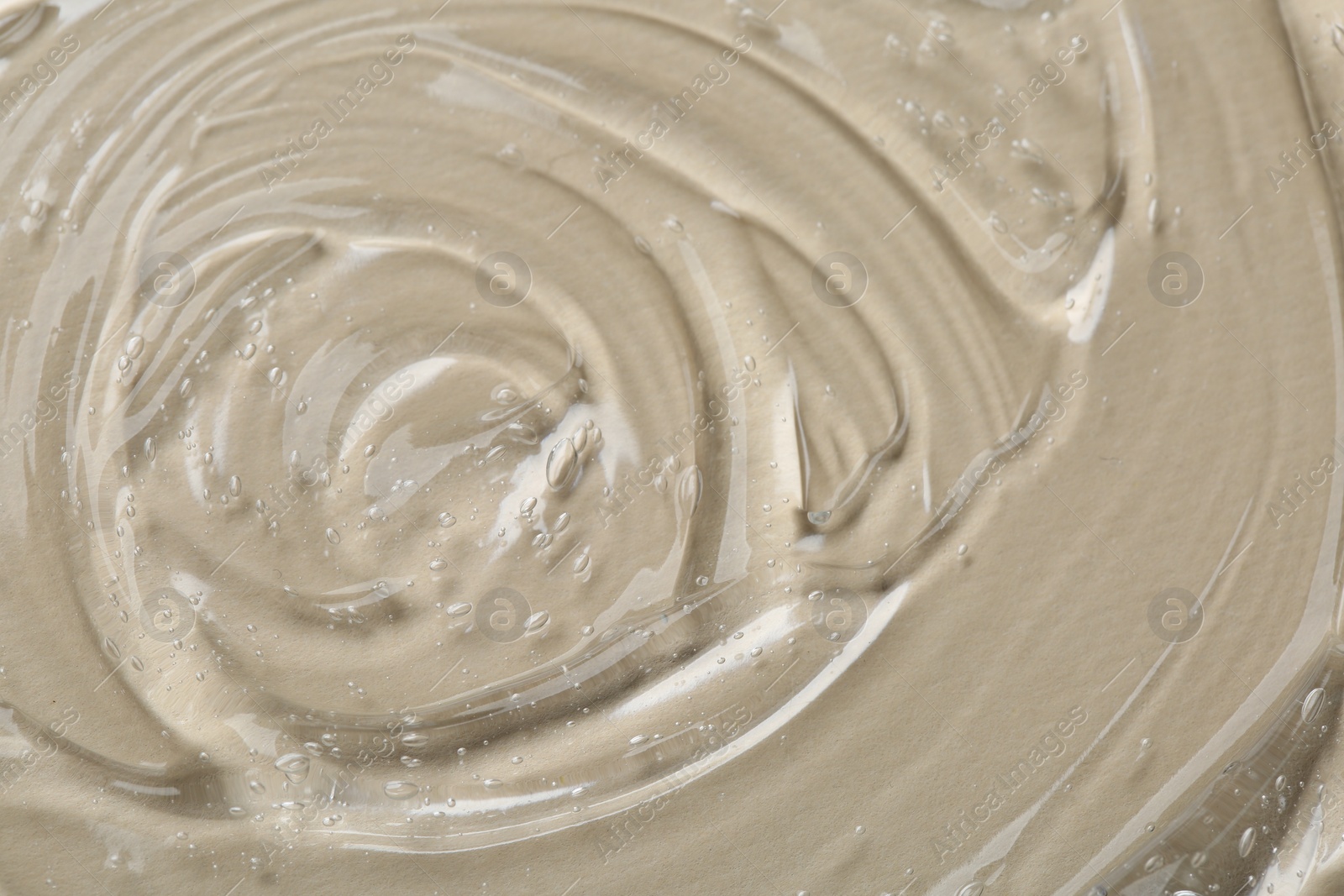 Photo of Cosmetic serum on beige background, top view