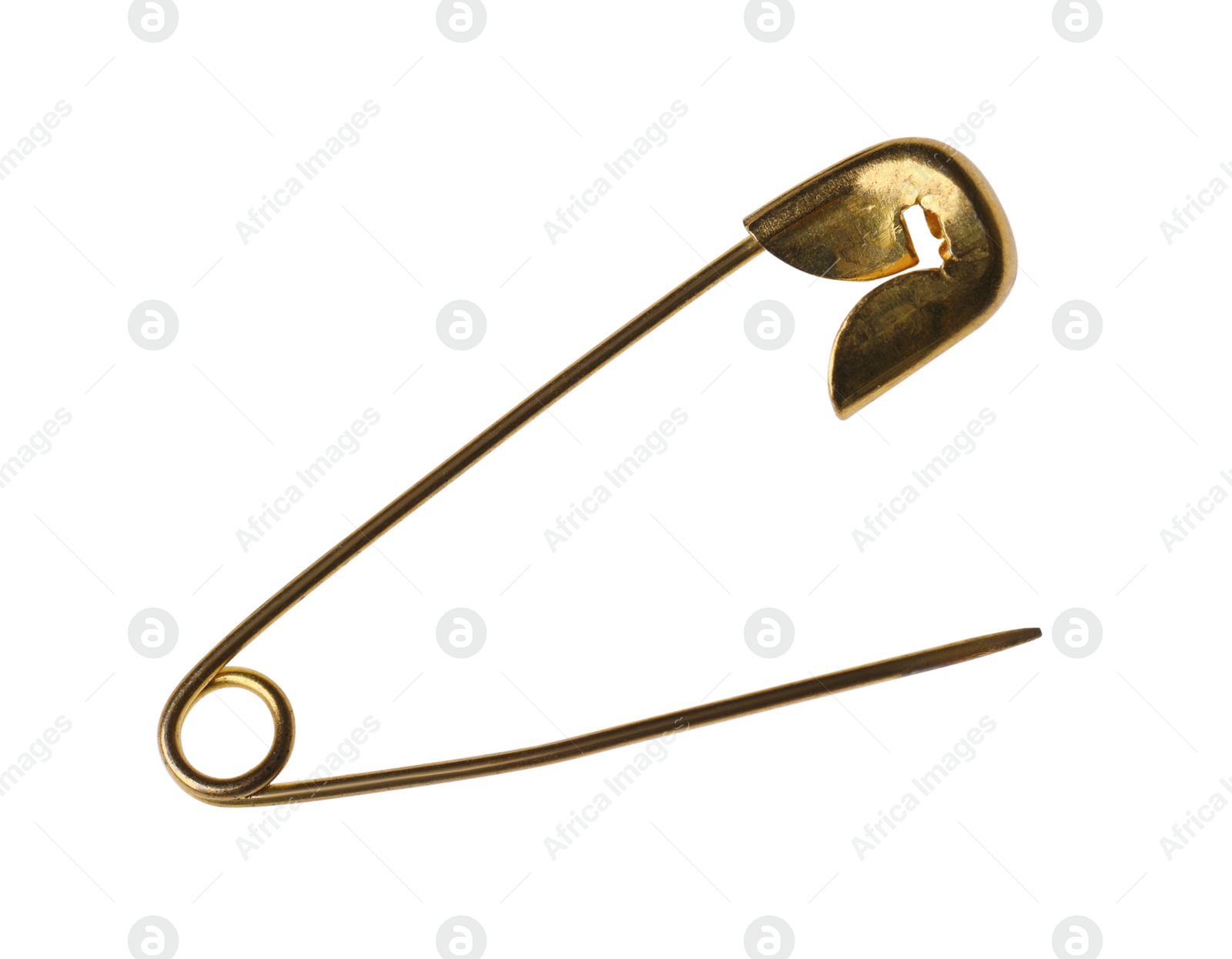 Photo of New golden safety pin isolated on white