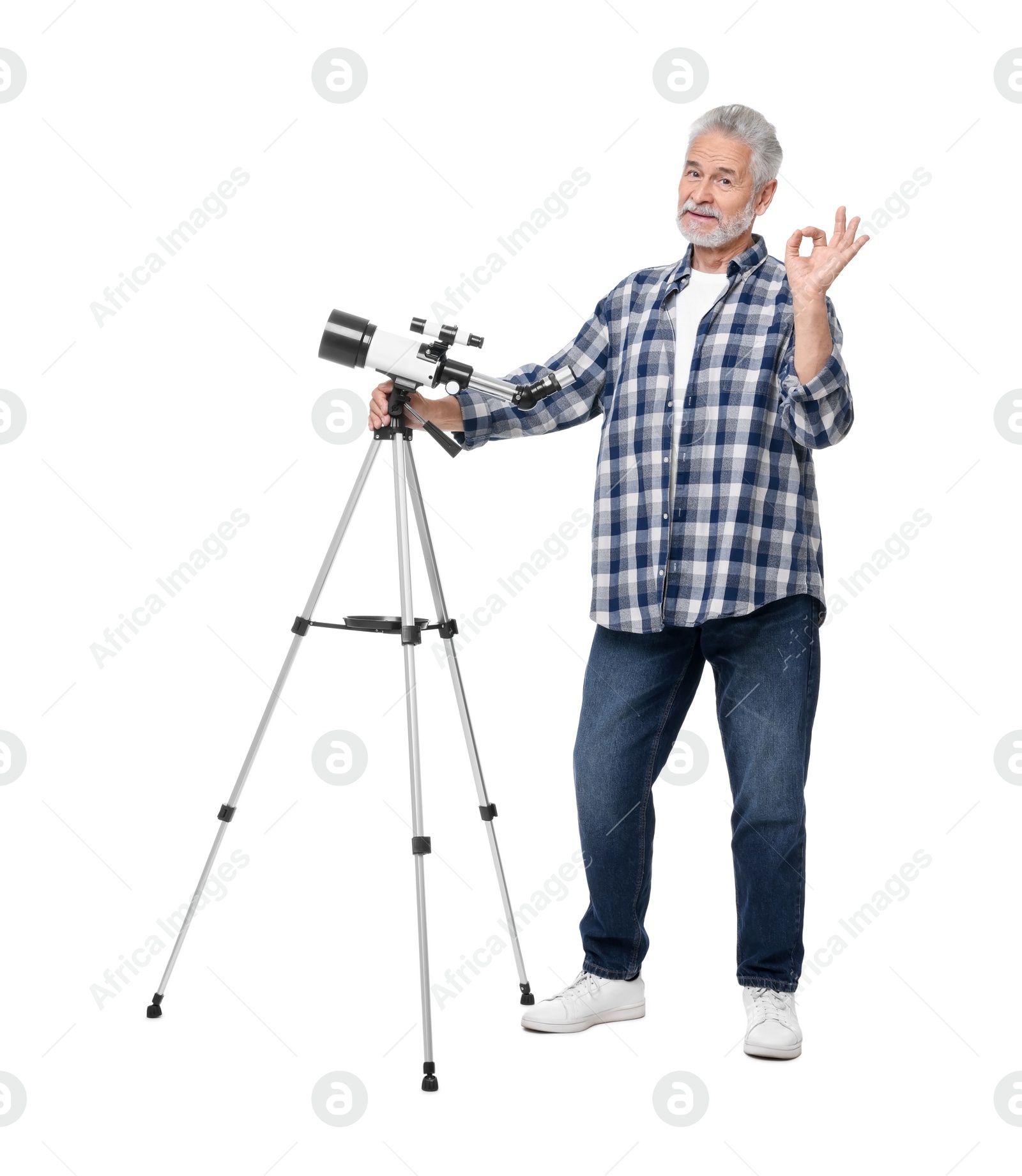 Photo of Senior astronomer with telescope showing okay gesture on white background