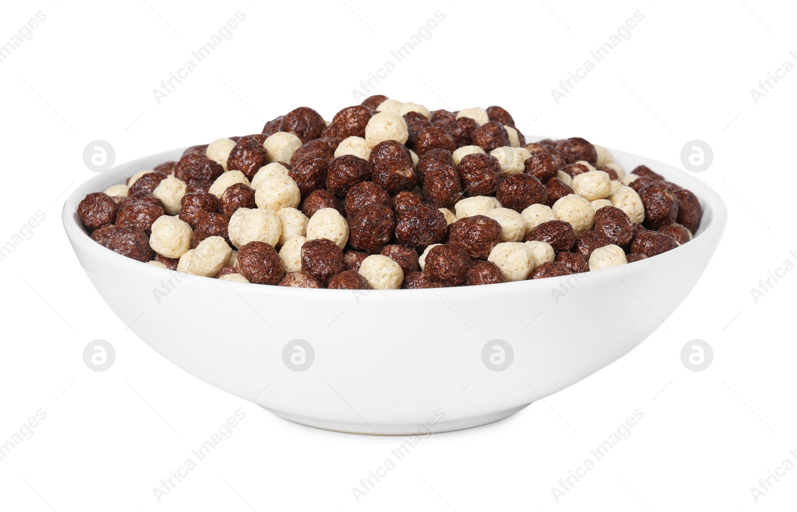 Photo of Tasty sweet cereal balls in bowl isolated on white