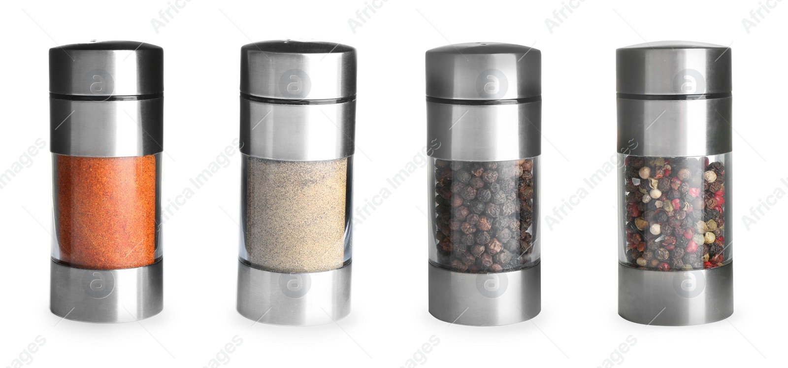 Image of Shakers with red and white pepper powders near black, mixed peppercorns in grinders on white background