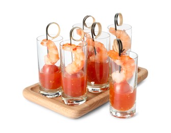 Photo of Tasty canapes with shrimps, tomatoes and sauce in shot glasses isolated on white