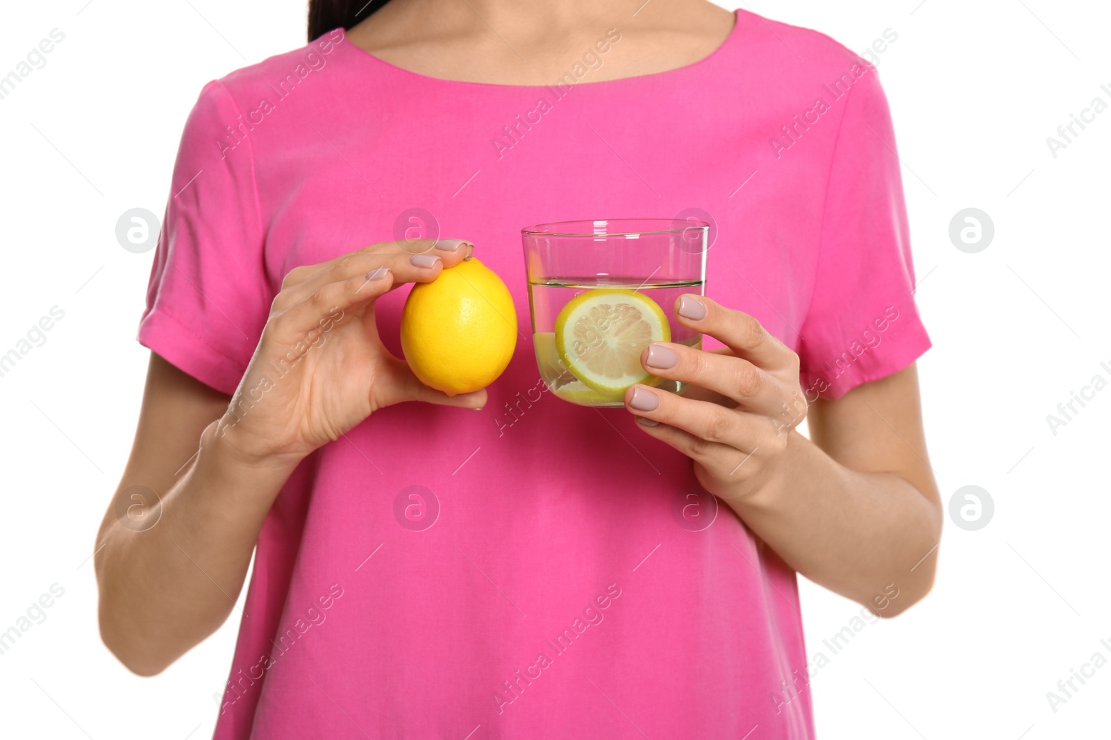 Photo of Woman with tasty lemon water and fresh fruit on white background, closeup