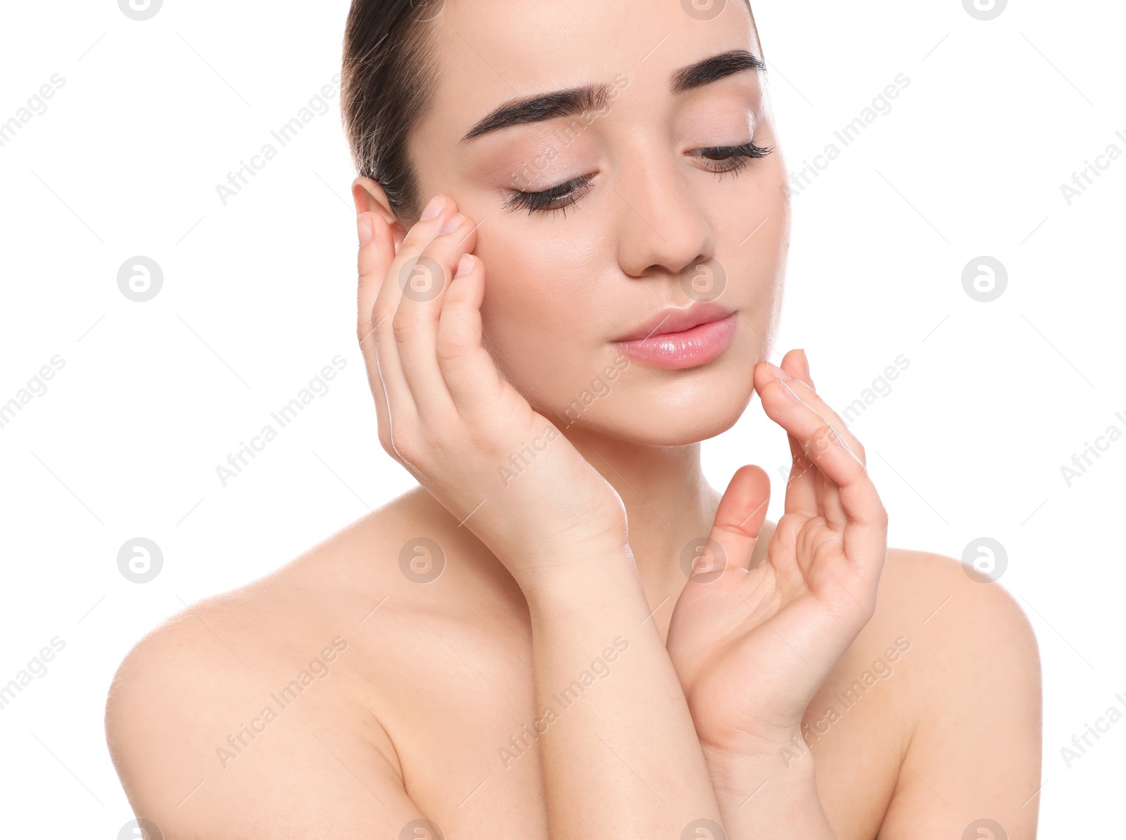 Photo of Portrait of young woman with beautiful face against white background