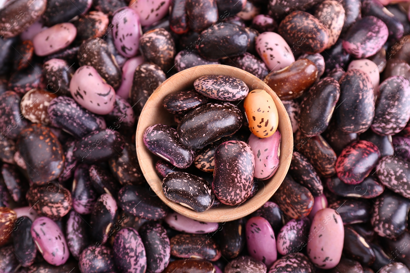 Photo of Bowl on dry kidney beans, top view