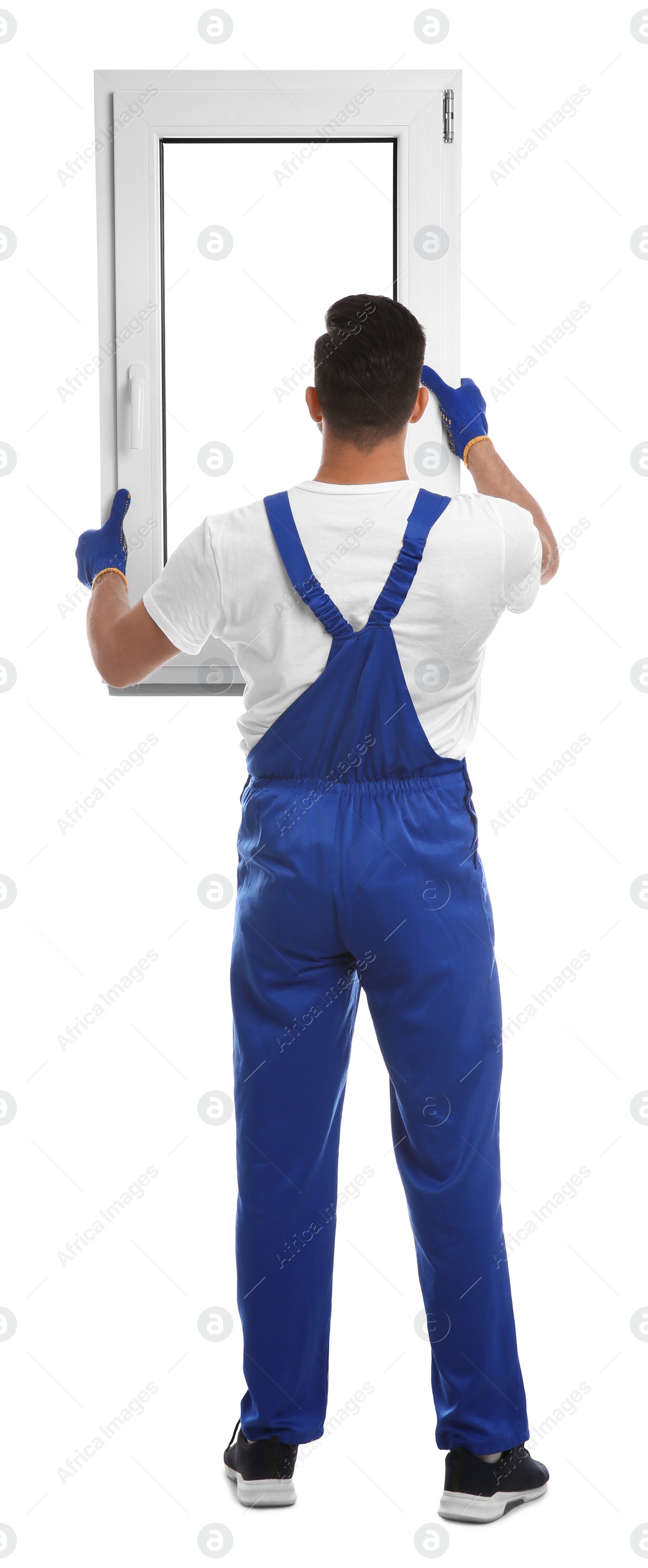 Photo of Worker with plastic window on white background, back view. Installation service