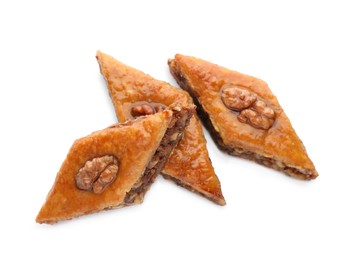 Delicious turkish baklava on white background, top view. Eastern sweets