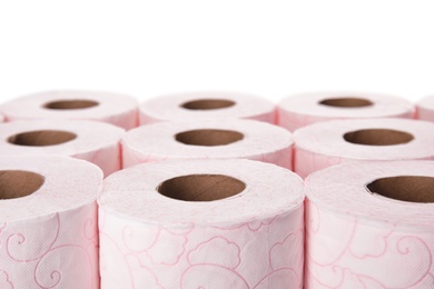 Photo of Many rolls of toilet paper on white background