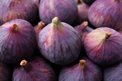 Photo of Fresh ripe figs as background, closeup view